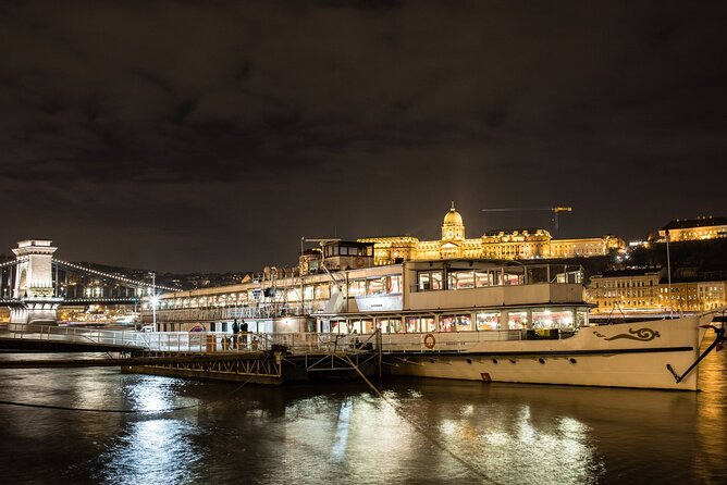 10PM Budapest Danube Cruise with Live Music & Food or Drinks - Candlelight, a welcome drink, and the choice of dinner