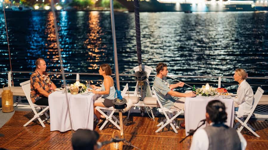 Bali/Benoa: 5-Course Romantic Evening Cruise With Live Music - Sailing Benoa Bay toward Nusa Dua