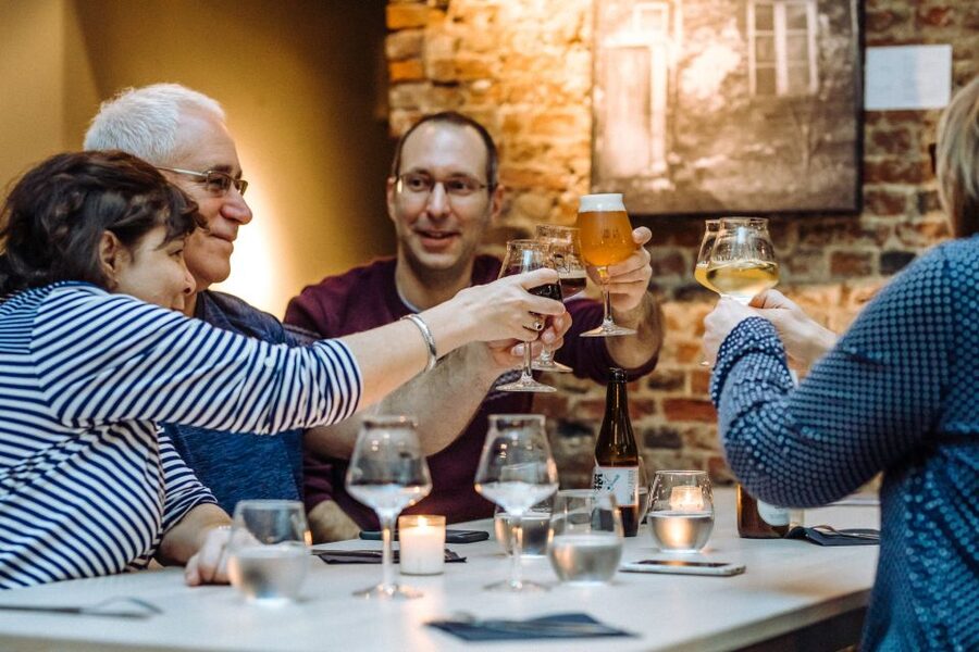 Brussels: Private Beers, Bars, and Live Music Tour by Night - A traditional pub at Poechenellekelder