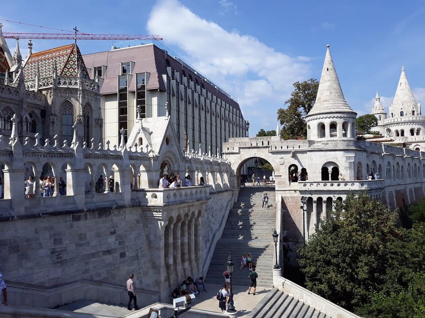 Budapest: Buda Castle Walking Tour & Folk Music Performance - Matthias Church and the stories of King Matthias