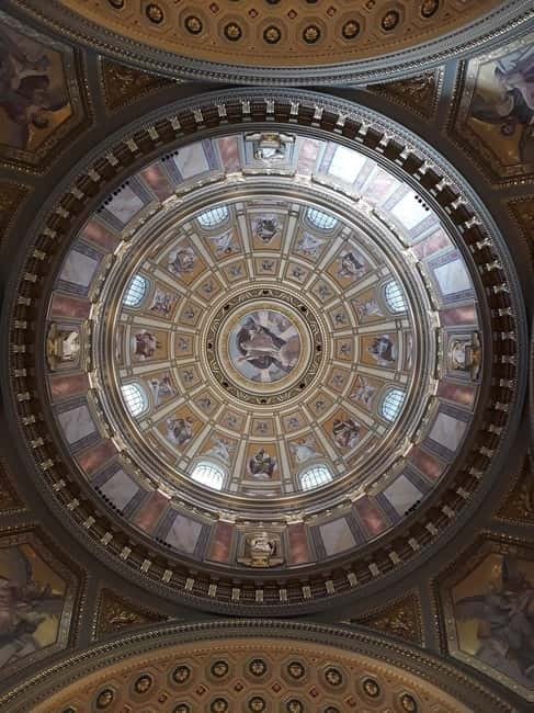 Budapest: St. Stephen's Basilica Tour & Music Performance - Inside the basilica: paintings, mosaics, sculptures, and altars