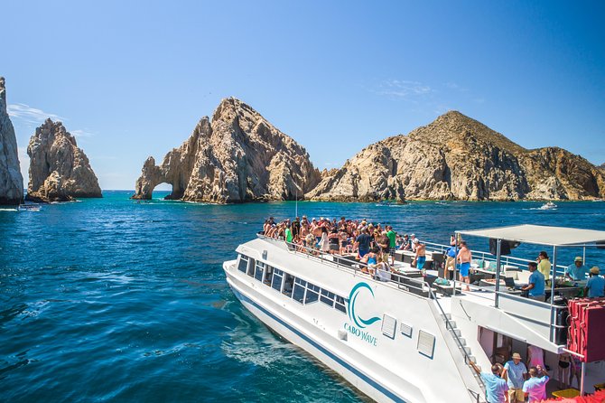 Cabo Sunset Dinner Cruise with Live Music & Open Bar on Cabo Wave - A sunset cruise built around Cabo’s best view