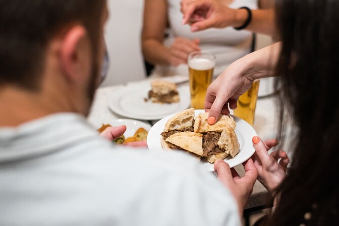 Devour Lisbon Food & Fado Tour Mouraria & Alfama Neighbourhoods - Nine tastings and three drinks for $129.51