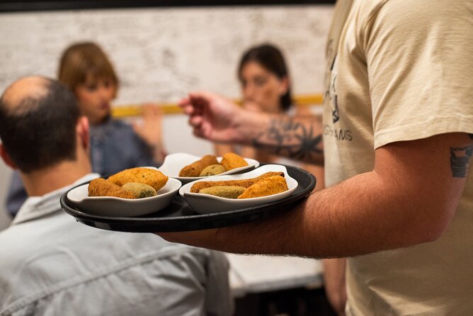 Devour Lisbon Food & Fado Tour Mouraria & Alfama Neighbourhoods - A small group with guides who connect the pieces