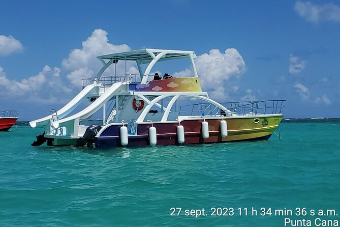 From Punta Cana: Party Boat + Snorkeling Live Music Drink Open B - Open bar, snacks, and tropical cocktails