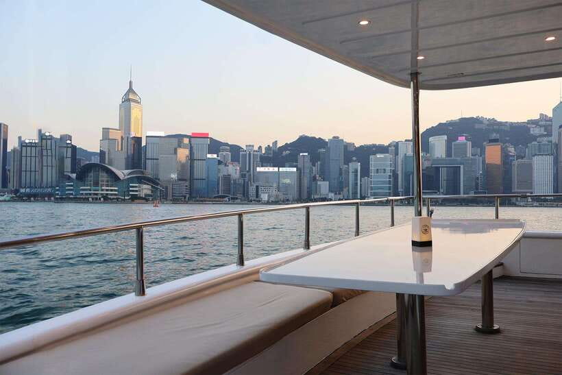 HK: Victoria Harbor Tour & Symphony of Lights (Free Drinks) - The SKYLINE CRUISE boat and open-air views