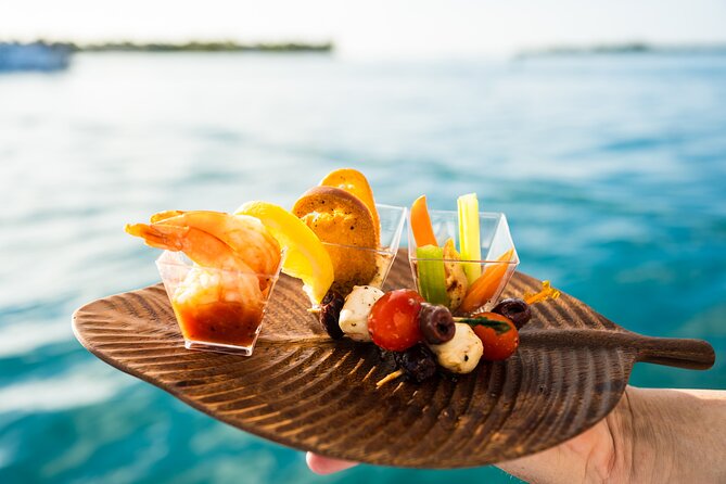 Key West Sunset Sail with Open Bar, Live Music and Hors D'oeuvres - Key West landmarks from the water