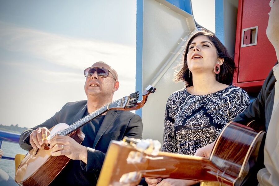 Lisbon: Boat Cruise with Live Fado Performance and a Drink - A small boat, not a luxury yacht