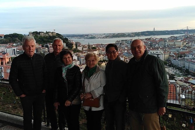 Lisbon By Night with Dinner and Fado Show Included - Illuminated monuments from the minibus