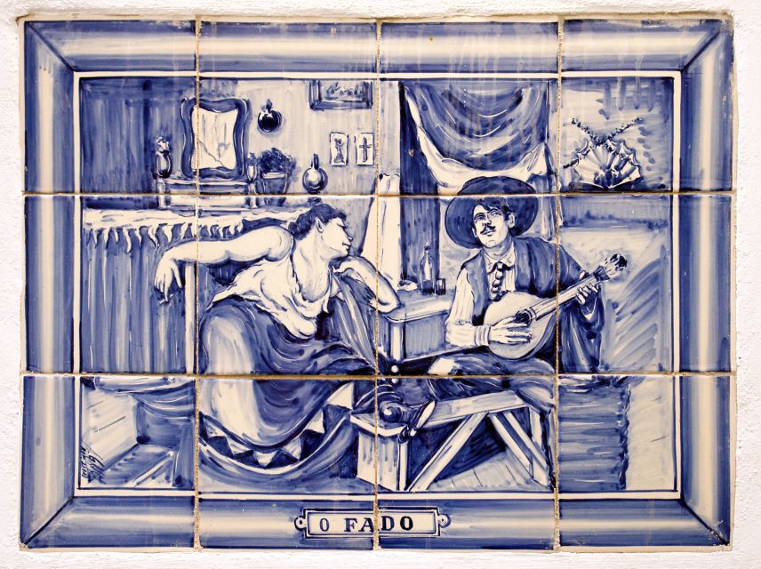 Lisbon: Fado Night Tour - Crossing the 25 de Abril Bridge after dark