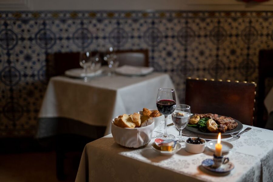 Lisbon: Fado Show and Portuguese Dinner - Taking Your Seat in a Traditional Fado House