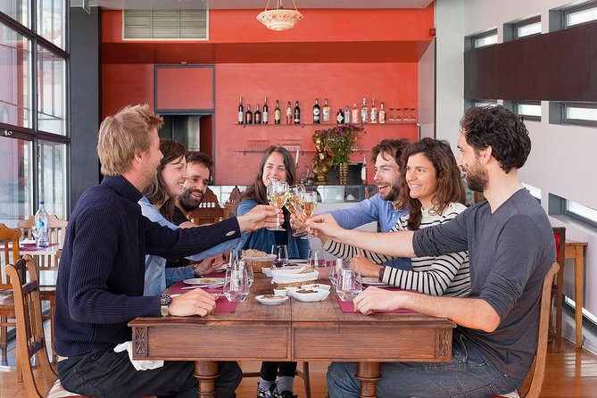 Lisbon Food Tour with 3 Stops and Fado Show Performance - Stop two: wine, small producers, and petiscos