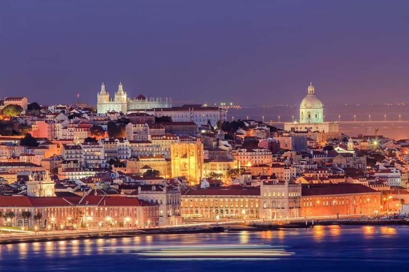 Lisbon: Private Night Tour with Fado Dinner Show - Lisbon at night, with the driving handled