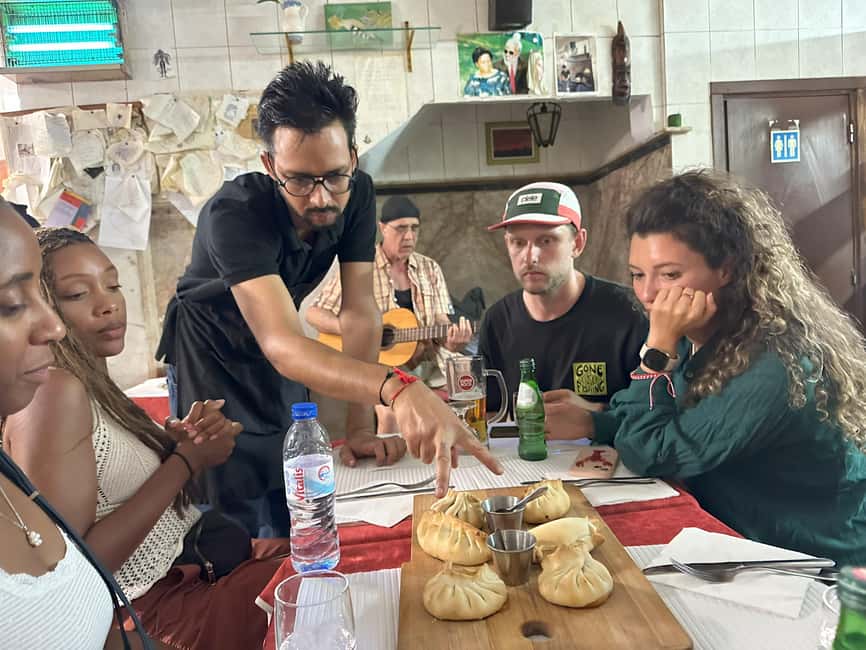 Multicultural Lisbon: Hidden Stories, Art, Food & Live Music - Martim Moniz and a first local drink