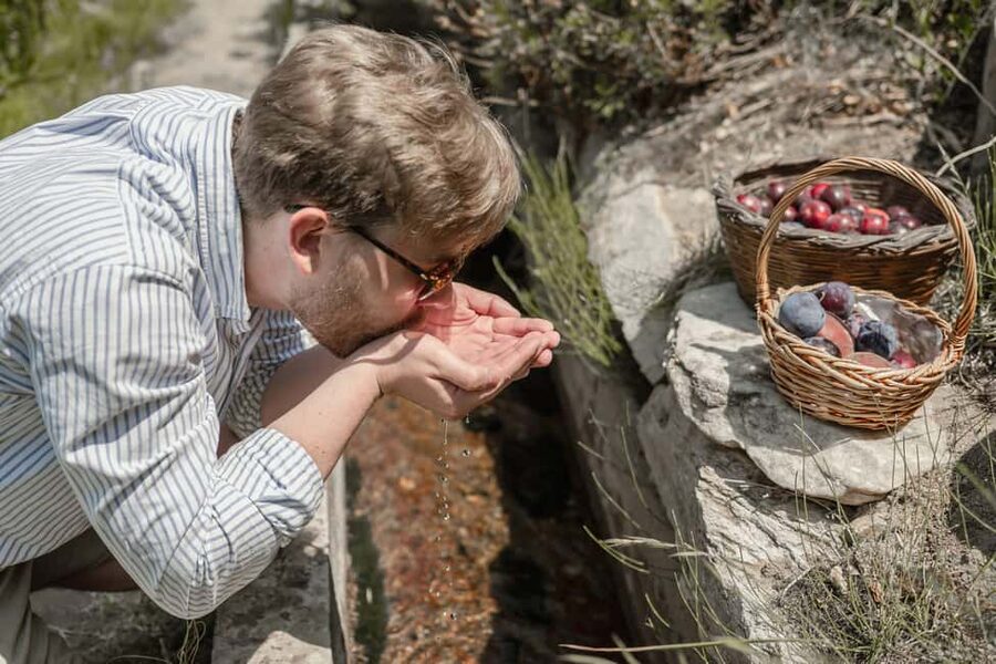 Naxos: Family Farm-table Cooking, Kouros Tour & Live Music - Walking through Flerio and the old olive press