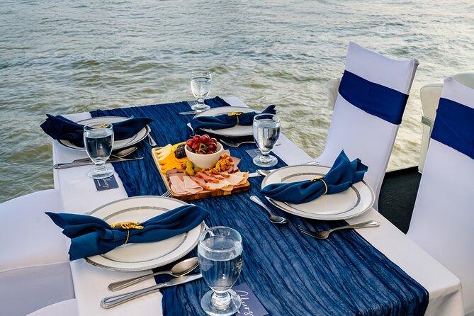 New York City Dinner Cruise on Luxury Yacht with Live Music - The dining room, private tables, and live music