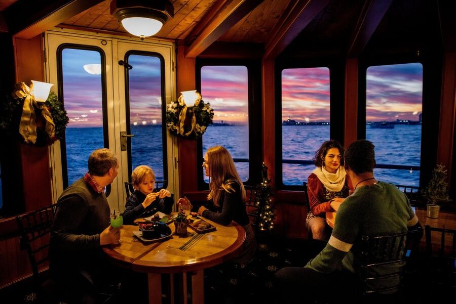NYC: Holiday Yacht Cruise with Jazz, Cocoa & Carols - The Statue of Liberty photo stop