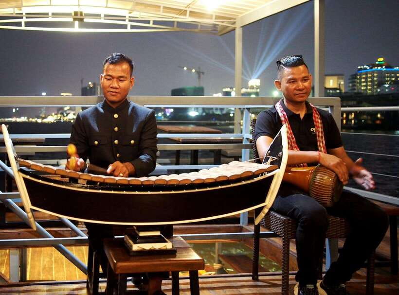 Phnom Penh: Mekong Sunset Dinner Cruise with Live Music - Dinner, Snacks, and the $9 Question
