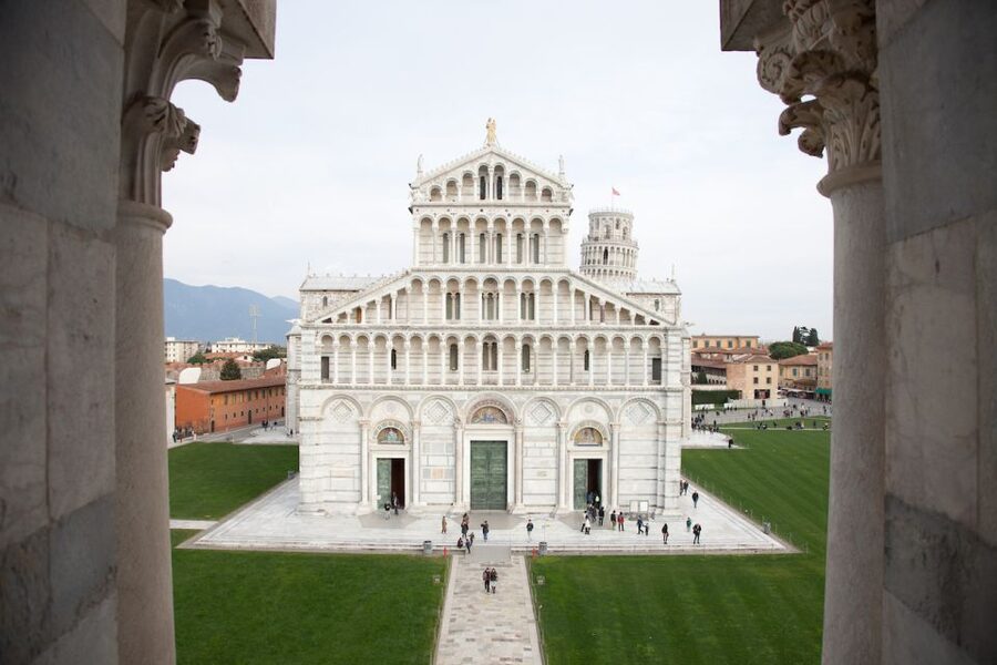 Pisa: Opera del Duomo Museum, Cathedral Ticket & Audio Guide - Entering Pisa Cathedral with Romanesque detail