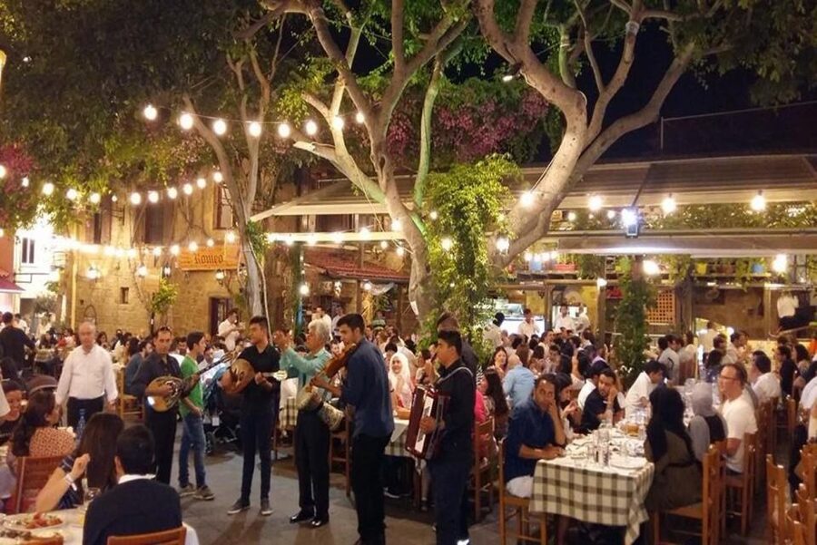 Rhodes: Guided Rhodes City By Night with Live Music & Dinner - Dinner, regional food, and live Greek music
