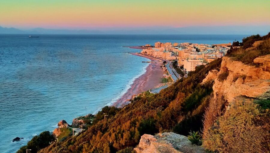 Rhodes: Guided Rhodes City By Night with Live Music & Dinner - From your hotel to Mandraki Harbor
