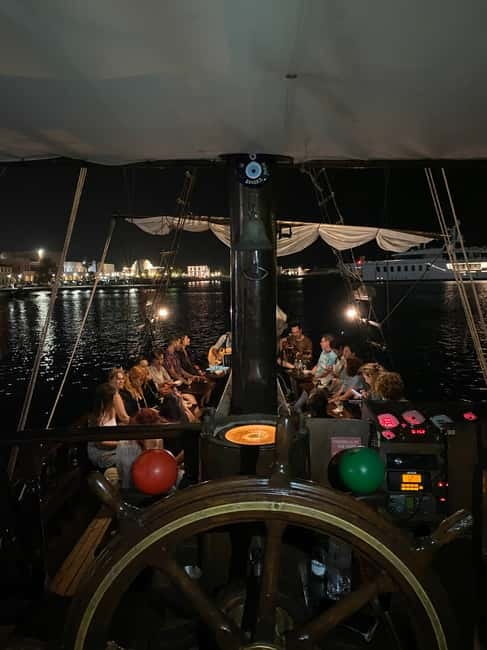 Rhodes: Night Cruise with Live Music and Sightseeing. - Setting sail from Mandraki Harbor after sunset
