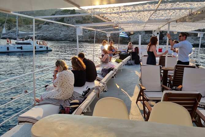 Rhodes Sunset Cruise - Swim and Dine w/ Live Music & Sunset! - Live Guitar on the Way Back