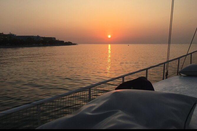 Rhodes Sunset Cruise - Swim and Dine w/ Live Music & Sunset! - Rhodes at Night from the Water