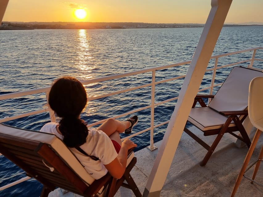 Rhodes: Sunset Cruise with Live Music, Wine & Greek Buffet - Greek buffet, wine, and the practical food question