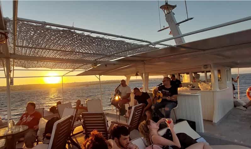 Rhodes: Sunset Cruise with Live Music, Wine & Greek Buffet - Live guitar music on the way back