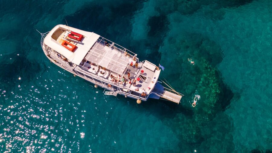 Rhodes: Sunset Cruise with Live Music, Wine & Greek Buffet - What the price includes, and where extras appear
