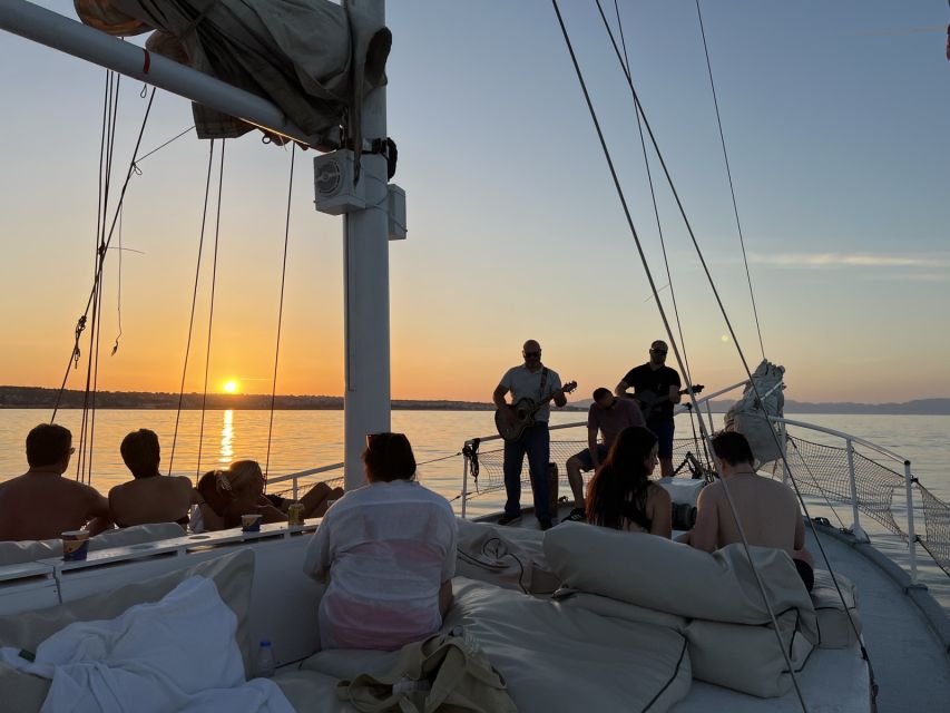 Rhodes: Sunset Cruise with Open Bar, Dinner, & Live Music - An open bar with Greek character