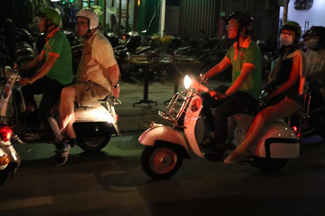 Saigon After Dark Vespa Street Food Tour + Live Music 4 hours - Banana cake and the story behind the food