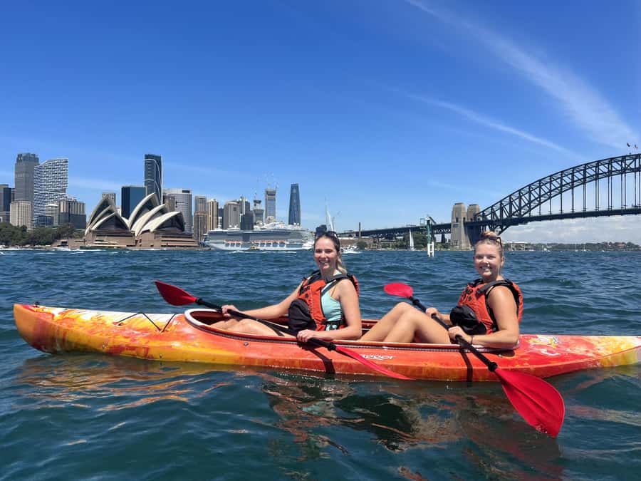 Sydney: Opera House and Harbour Guided Kayak Tour - Floating beneath Harbour Bridge views