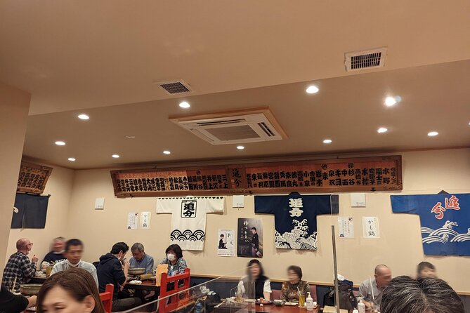 Tsugaru shamisen performance over traditional dinner - A roughly one-mile walk through the old district