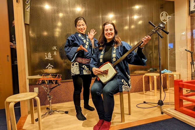 Tsugaru shamisen performance over traditional dinner - The Tsugaru-shamisen concert in a small restaurant