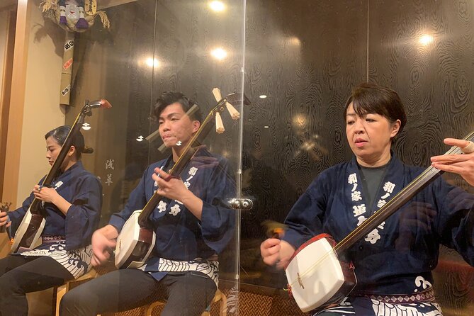 Tsugaru shamisen performance over traditional dinner - The guides and the small-group feel