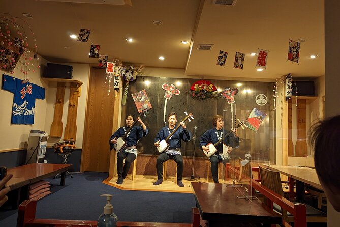Tsugaru shamisen performance over traditional dinner - Nakamise Street, a shopping lane with a different mood